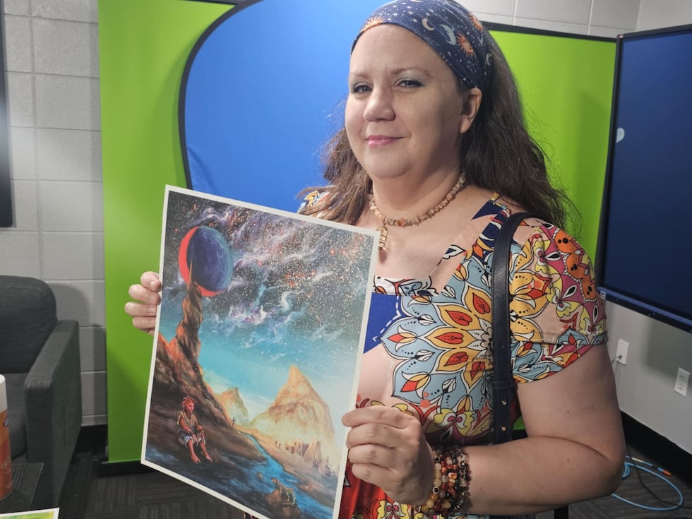 Shreveport artist Star Williams paints old-style sci-fi fiction art. One character of hers has...