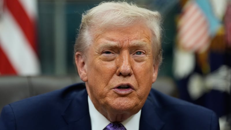 FILE - President Donald Trump speaks during a signing ceremony in the Oval Office of the White...