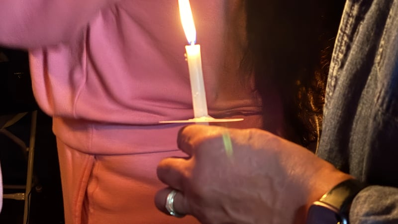 Community gathers at grocery store with personal ties to the family